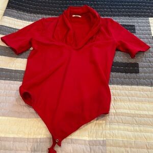 Wolford bodysuit in red.